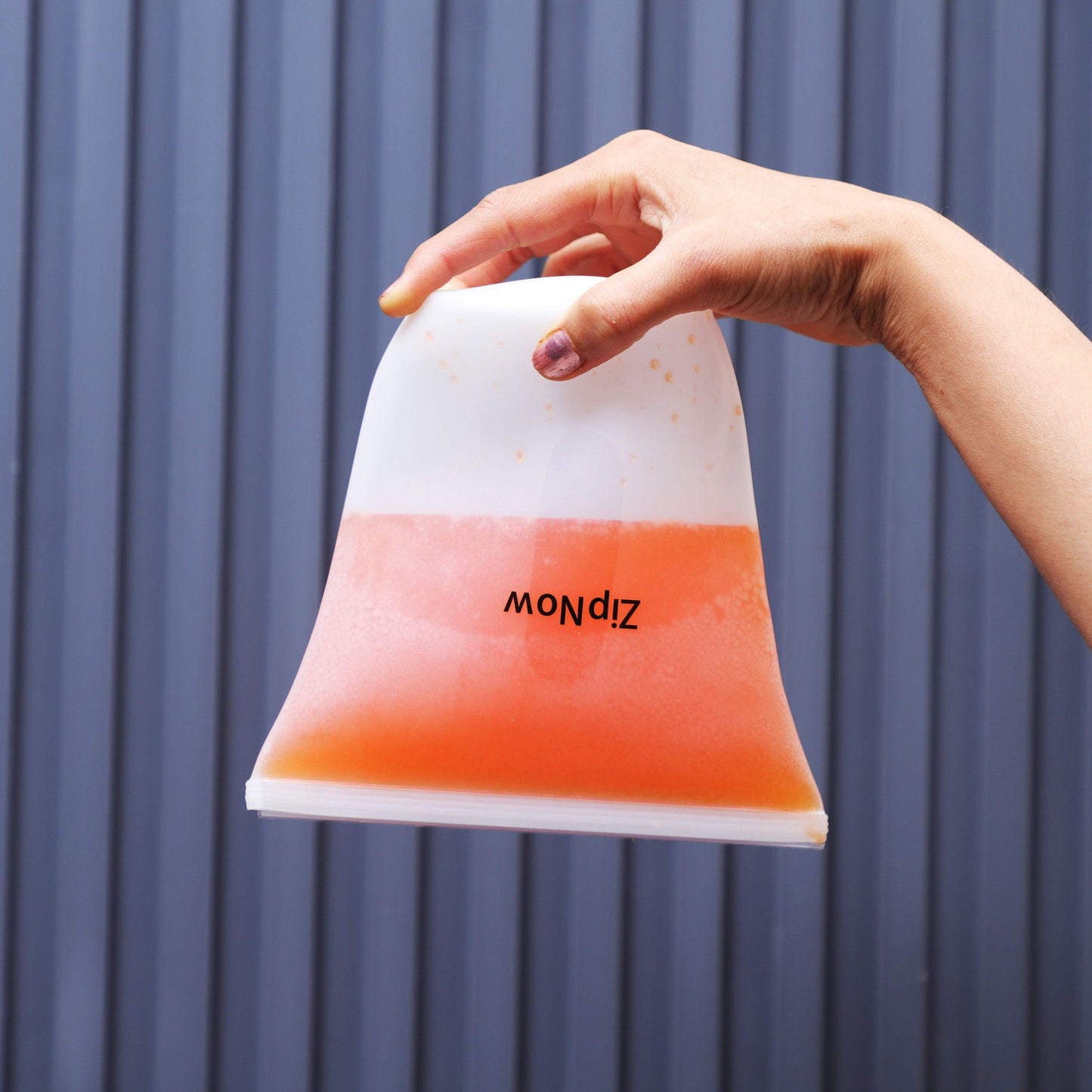 ZipNow Silicone Lifestyle Bag holding liquid contents like curry or gravy — leakproof and mess-free storage