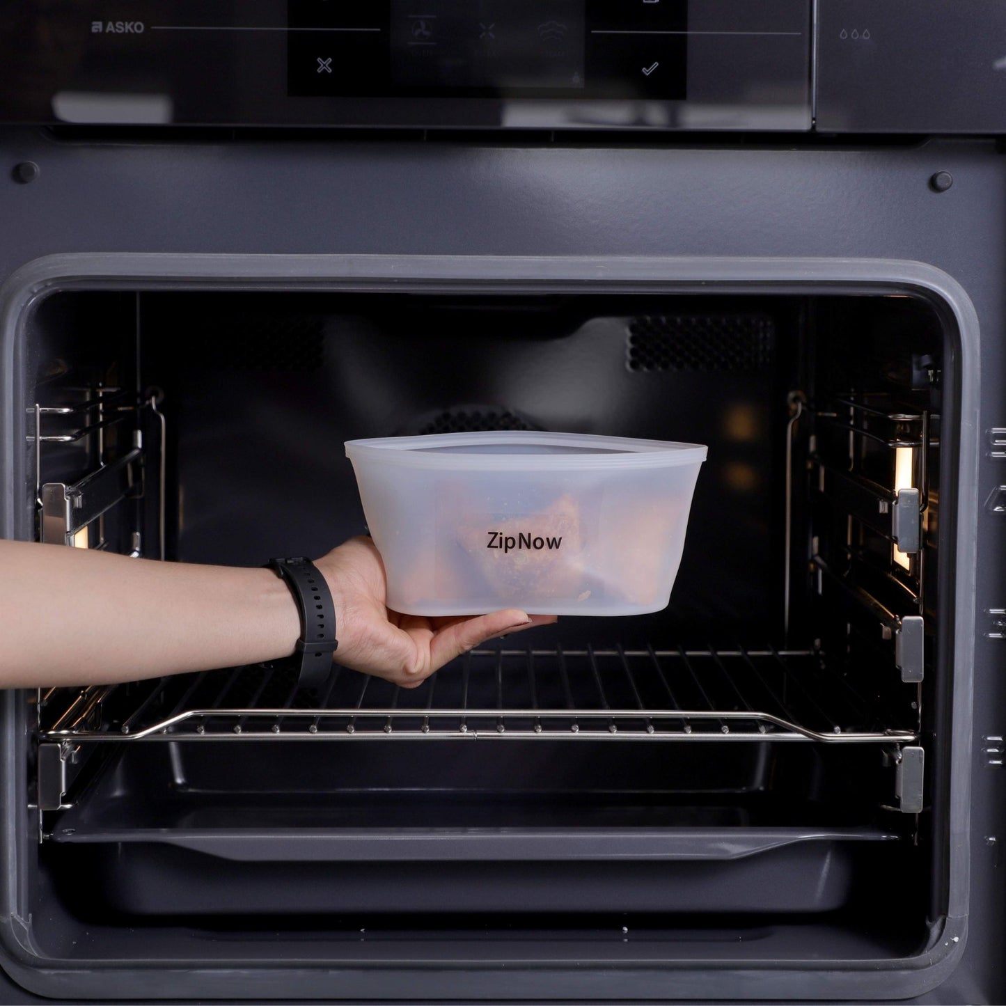 ZipNow Silicone Lifestyle Bag used in microwave — safe for reheating or defrosting food.