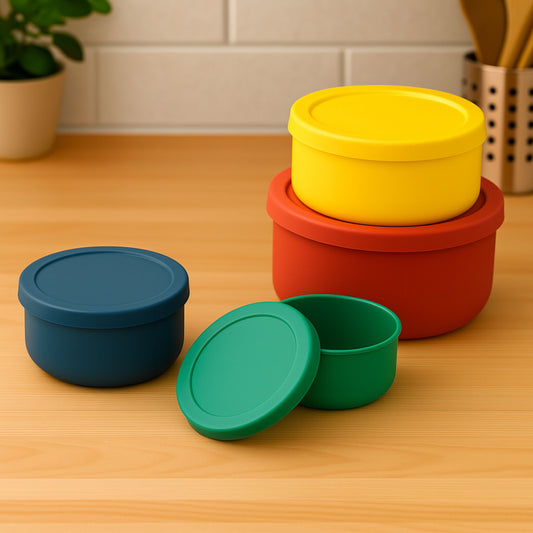 ZipNow silicone round containers in vibrant colors placed on a kitchen counter for multipurpose use.
