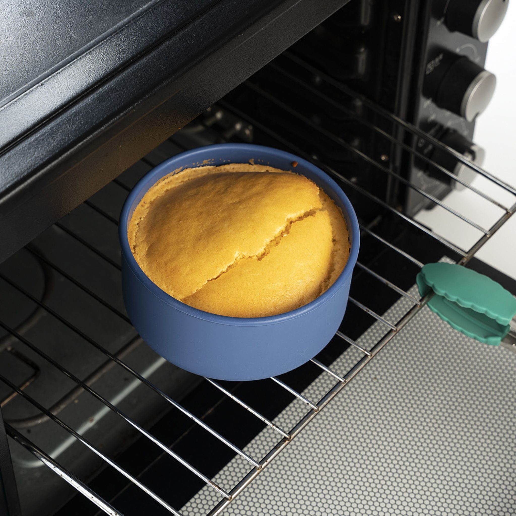 ZipNow silicone round container used for baking a cake directly in the oven.
