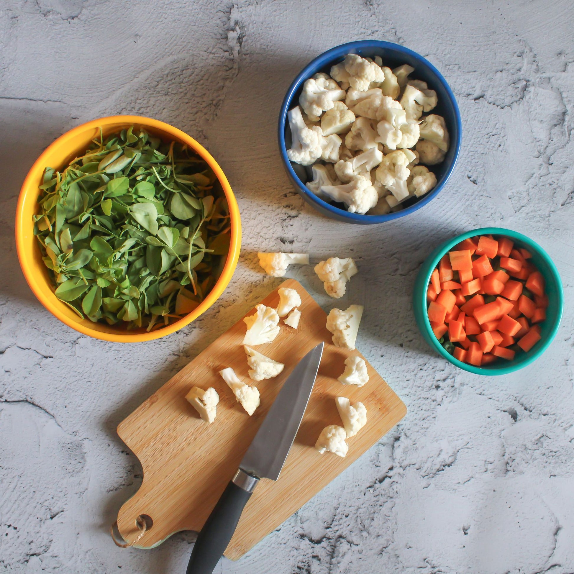 ZipNow silicone round bowls filled with chopped vegetables—ideal for meal prep and storage.
