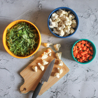 ZipNow silicone round bowls filled with chopped vegetables—ideal for meal prep and storage.
