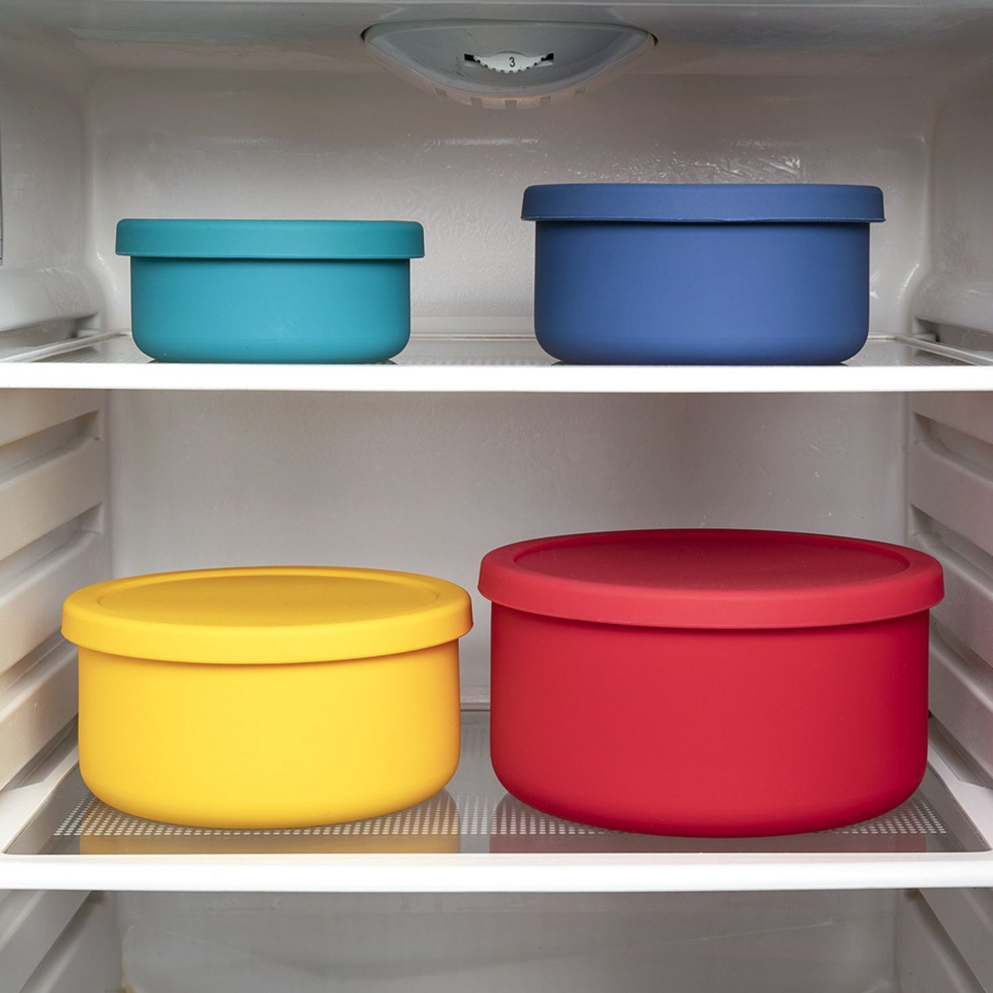 Silicone round containers in fridge storage – organized food storage with ZipNow’s colorful containers.
